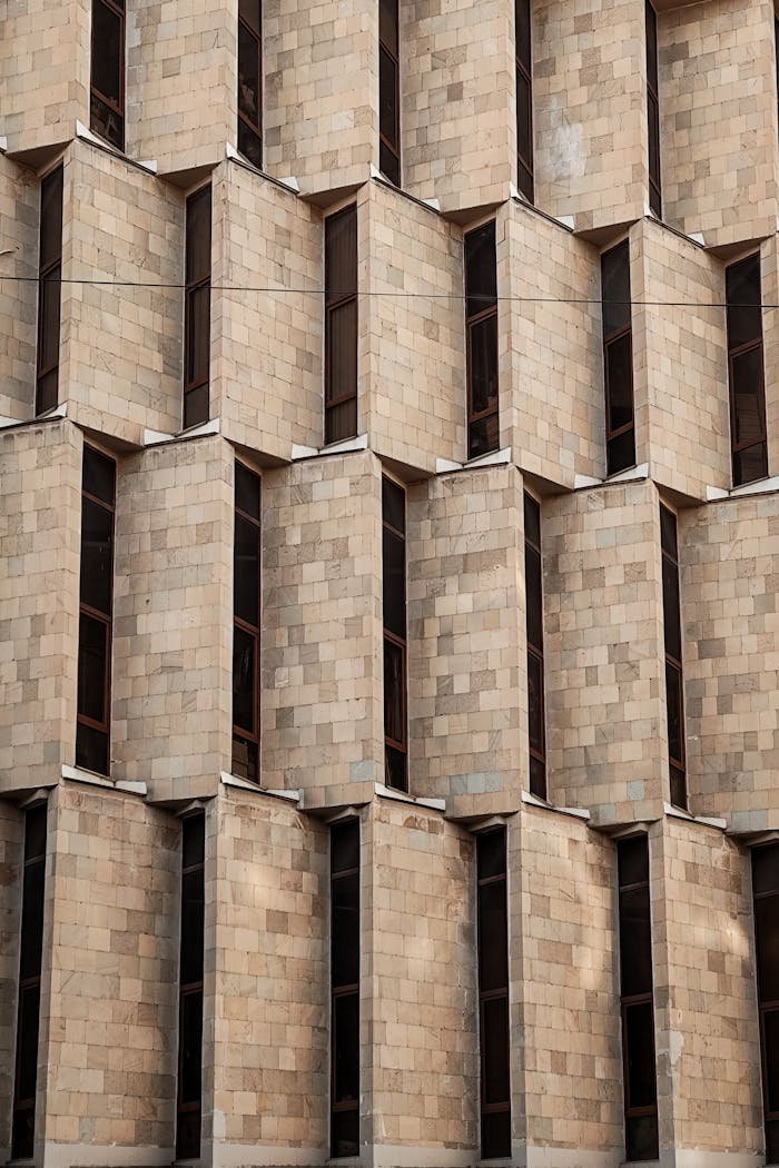 Close-up of a geometric building facade in Yerevan, Armenia, showcasing modern architecture.